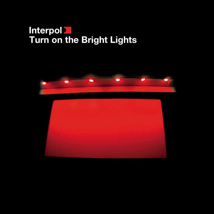 Gramofonik vinyl LP of Interpol's "Turn On The Bright Lights" with the album cover art visible.