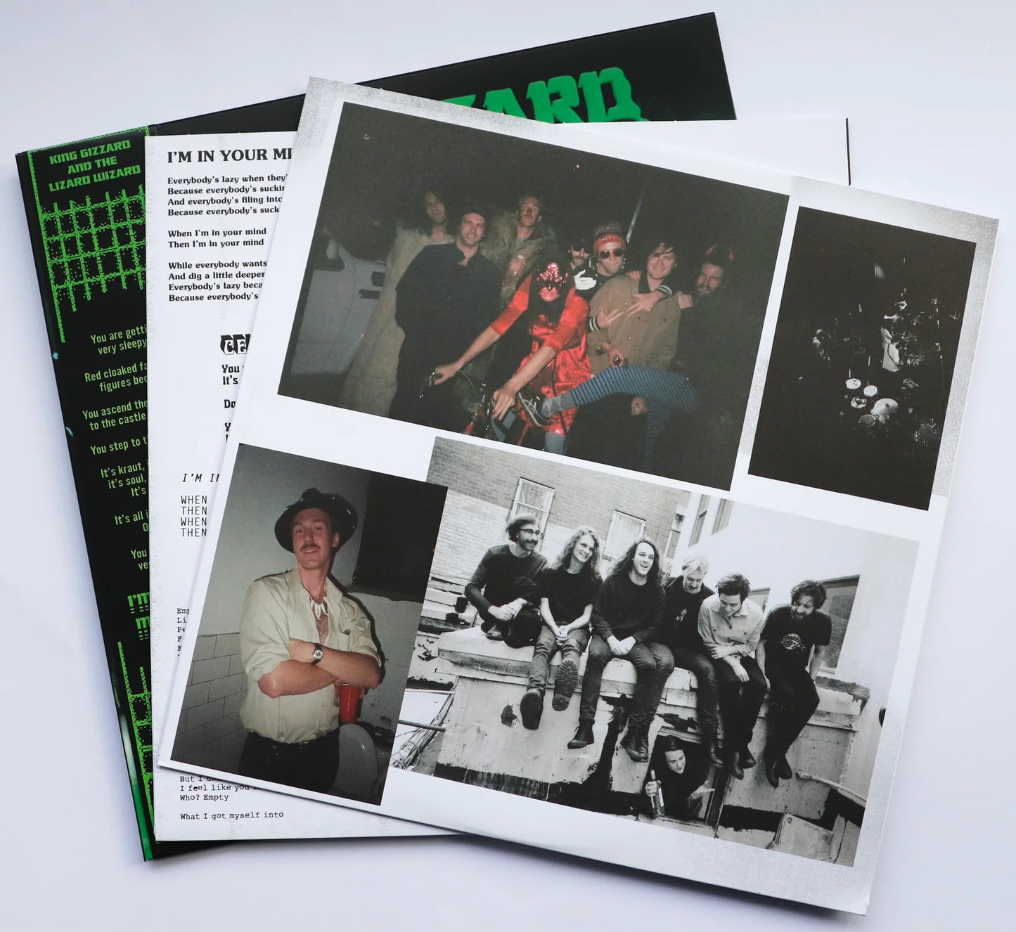 Collection of black and white photos and printed text on a white background