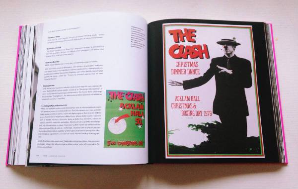 Open book with a page featuring an image of 'The Clash' and text.