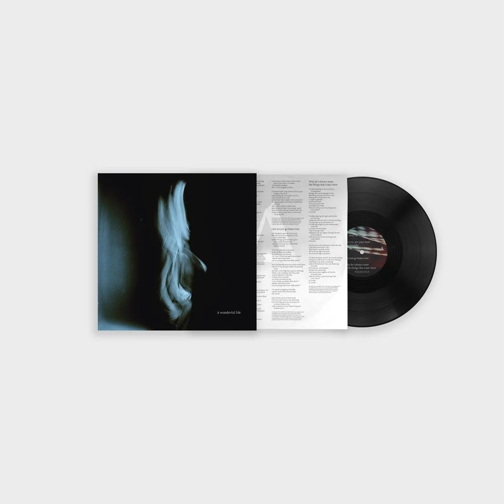 Vinyl record with cover on a white background