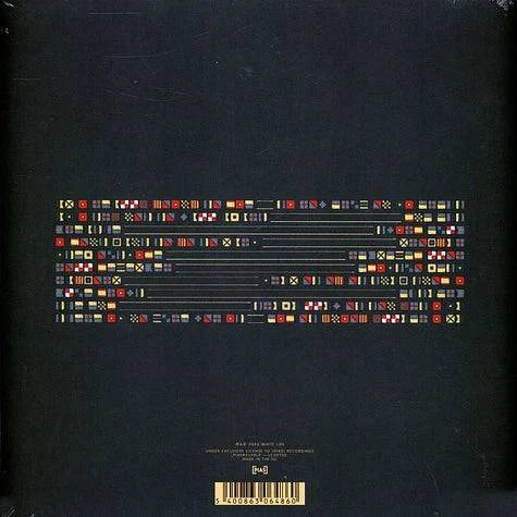 Album cover with a pattern of small squares on a dark background